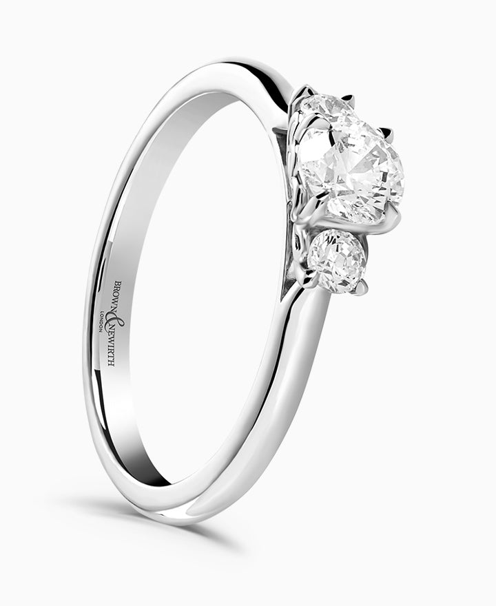 Cherry Blossom Platinum Round Brilliant Cut Three Stone Diamond Ring - 0.66ct