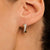 Milano CZ Crossover Huggie Hoop Earrings - Yellow/Silver
