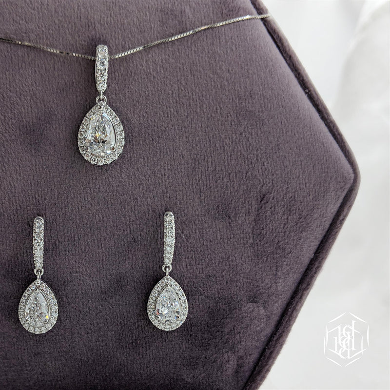 Platinum Pear Shaped Diamond Halo Pendant - 0.89ct