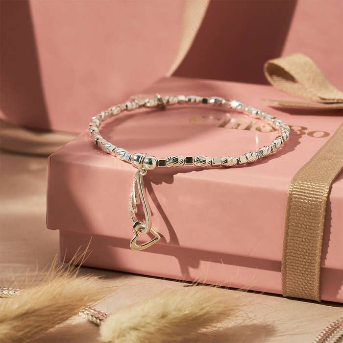 Soul Glow Interlocking Heart & Angel Wing Bracelet - Silver - SBCFR3238