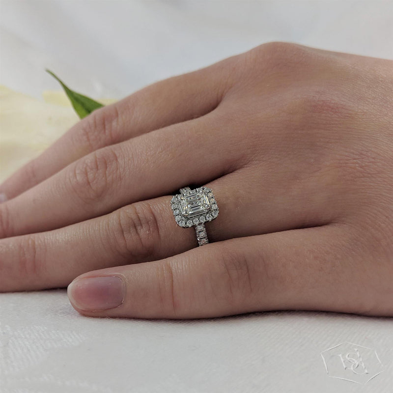 Platinum Emerald Cut Diamond Halo Engagement Ring - 0.71ct