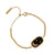olivia-burton-north-star-oval-black-gold-bracelet-objclb32