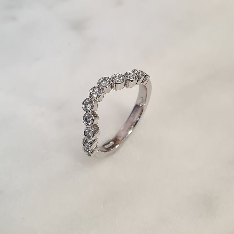 sarah-layton-platinum-curved-diamond-set-band-0-50ct