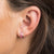 scream-pretty-candy-stripe-huggie-hoop-earrings-silver-pink-sps-61